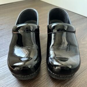 Dansko Black Patent Slip-On Clogs
